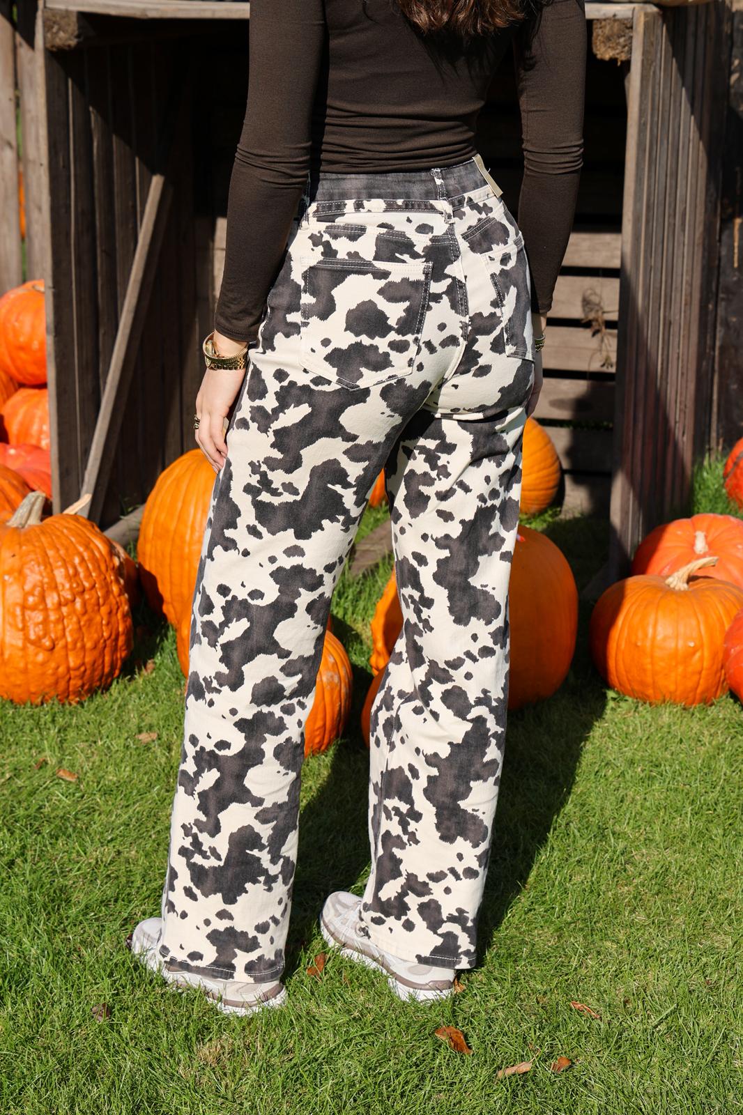 Cow print stretch jeans met ceintuur