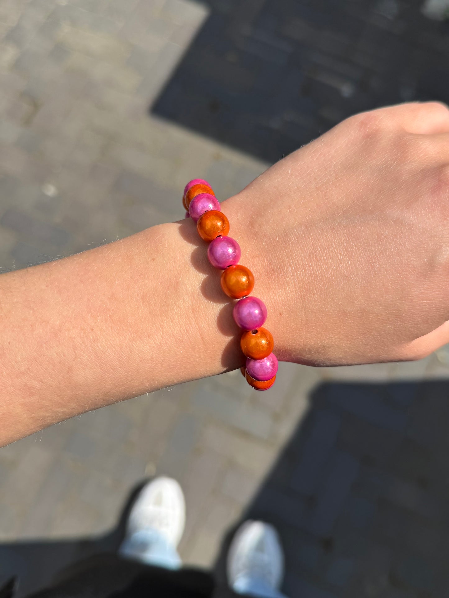 Kralen armband - roze oranje