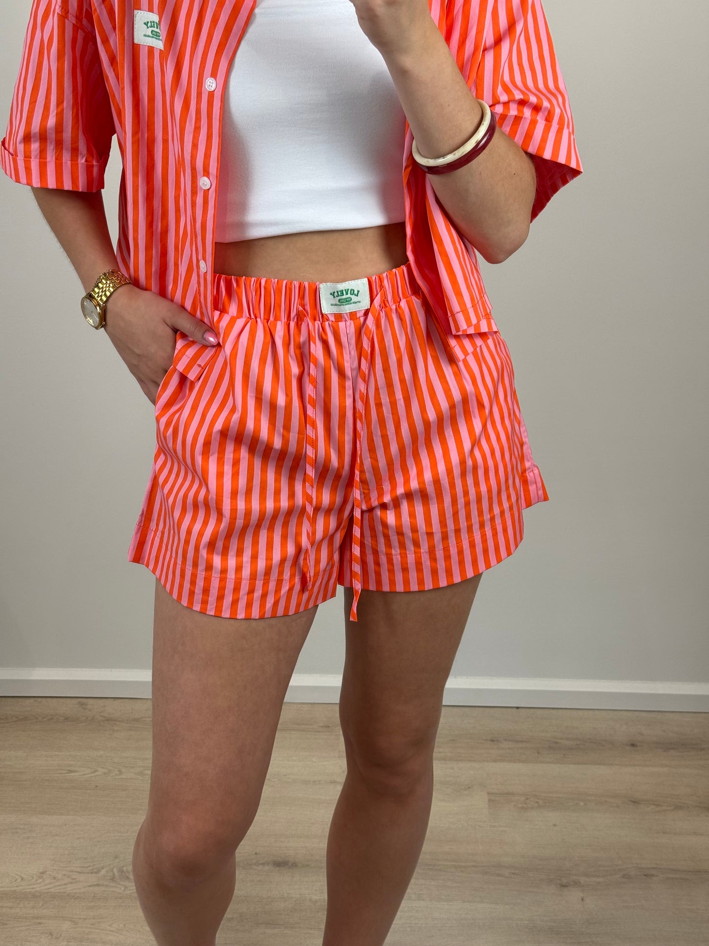 Gestreept short - oranje roze