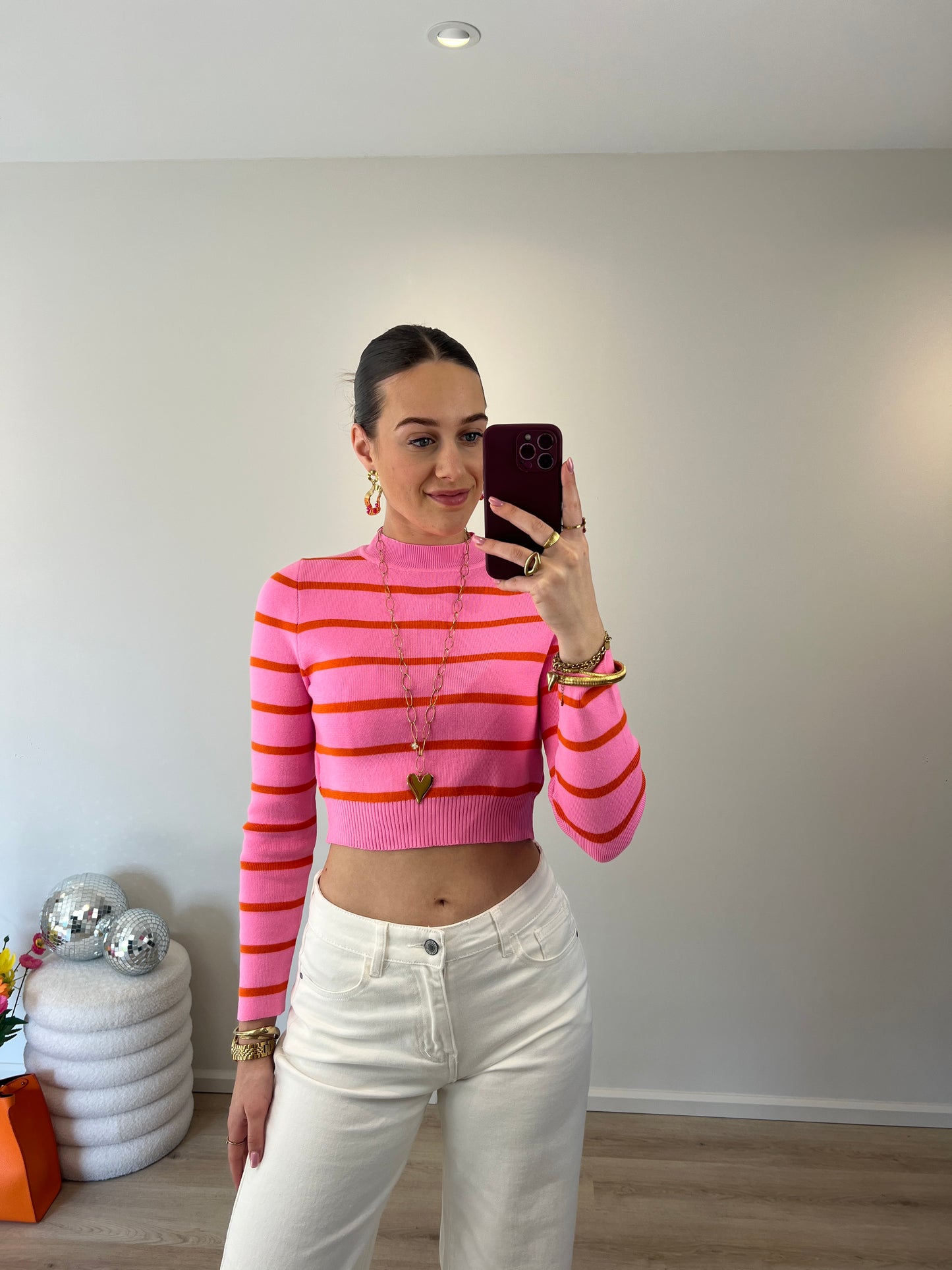 Roze top met oranje streep