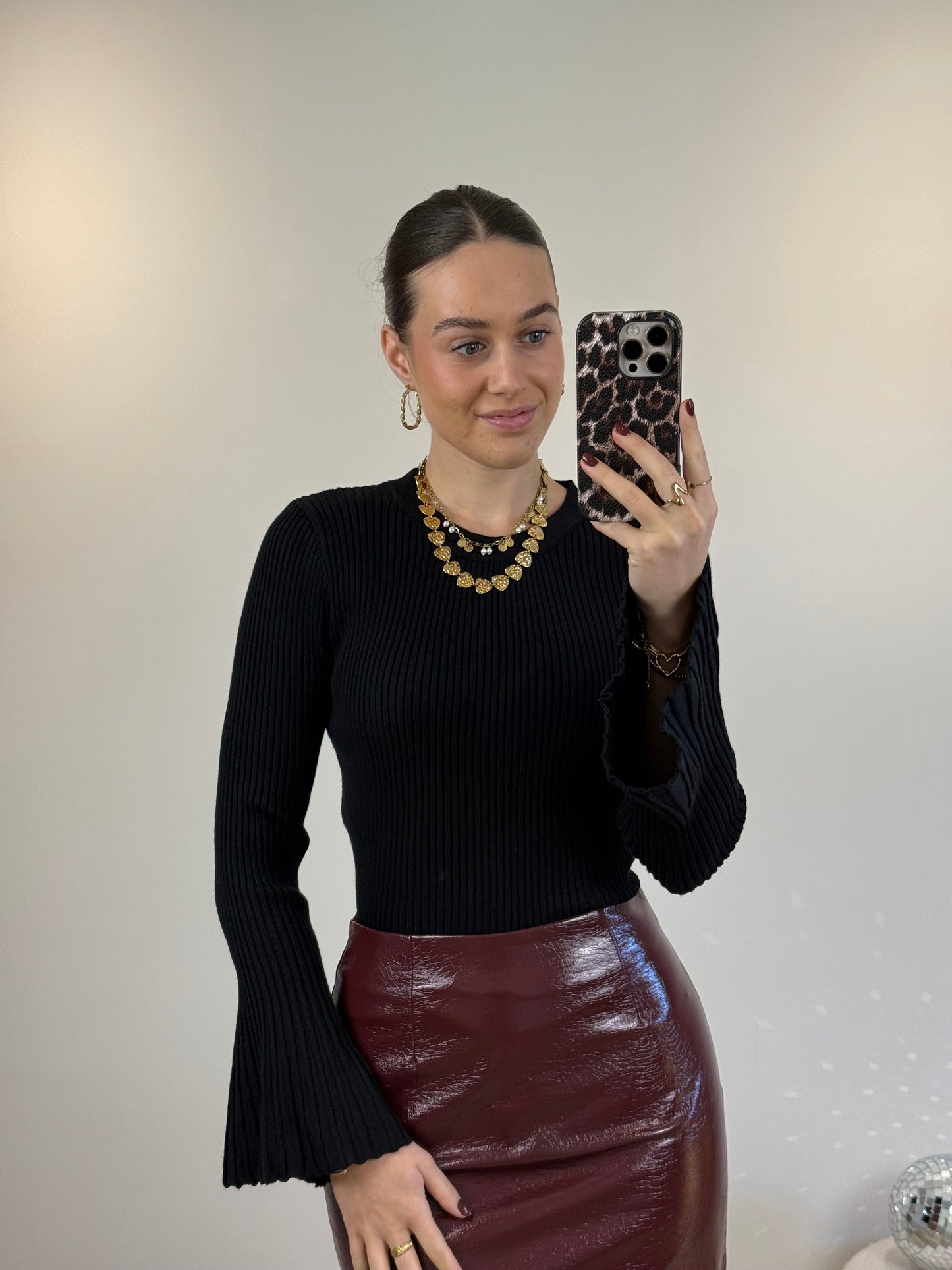 Top met uitlopende mouw - zwart