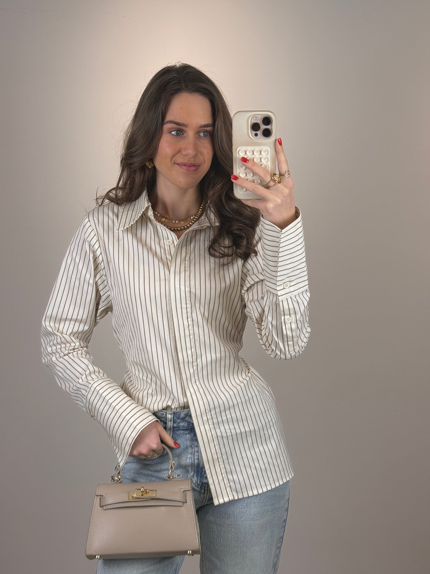 Getailleerde blouse met strik - beige