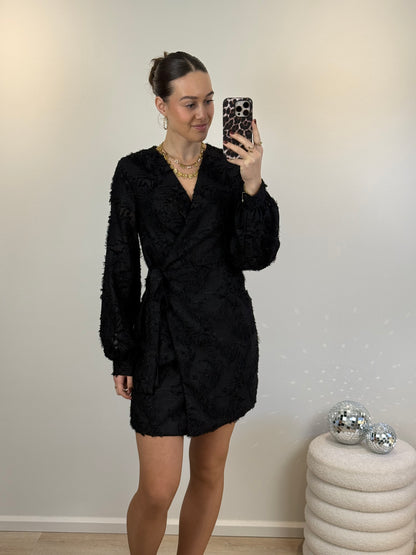 Overslag jurkje met franjes - zwart