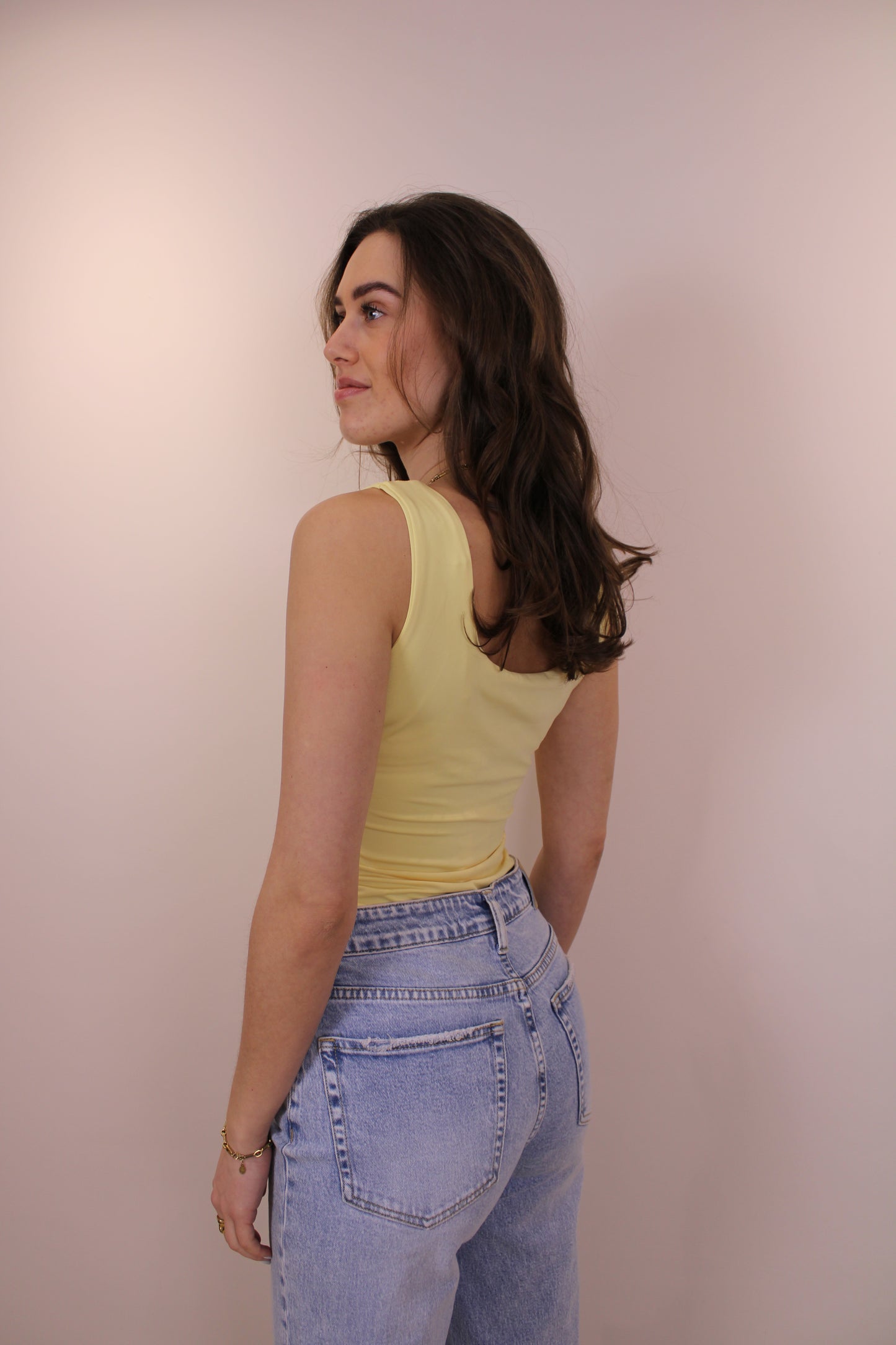 Body met spiegel studs - geel