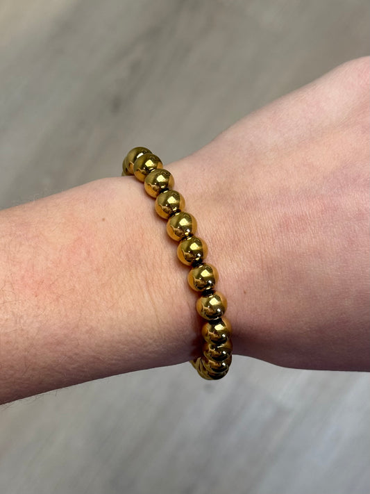 Elastiek kralen armband - goud