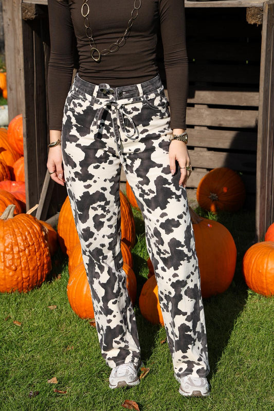Cow print stretch jeans met ceintuur