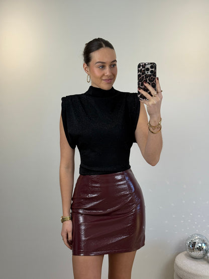 Glitter top met schoudervulling - zwart