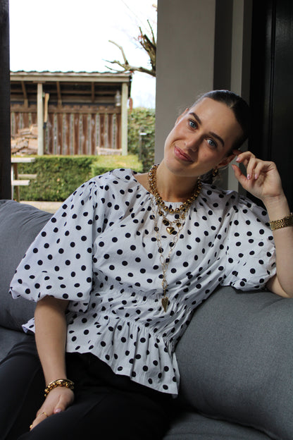 Polkadot top met pofmouw - wit zwart
