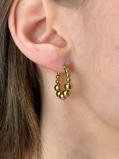 Kralen oorbellen - goud