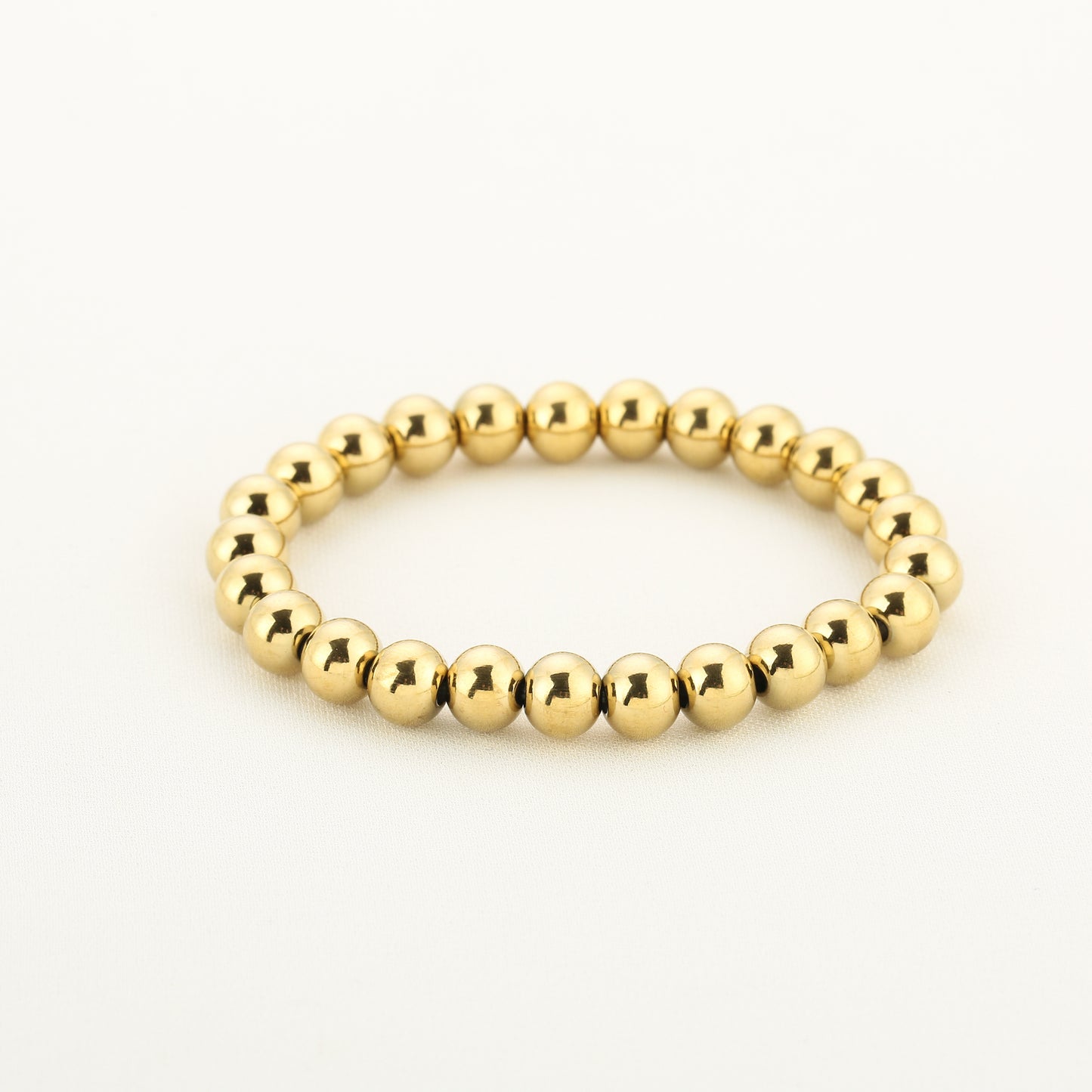 Elastiek kralen armband - goud