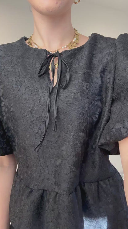 Top met pofmouw - zwart