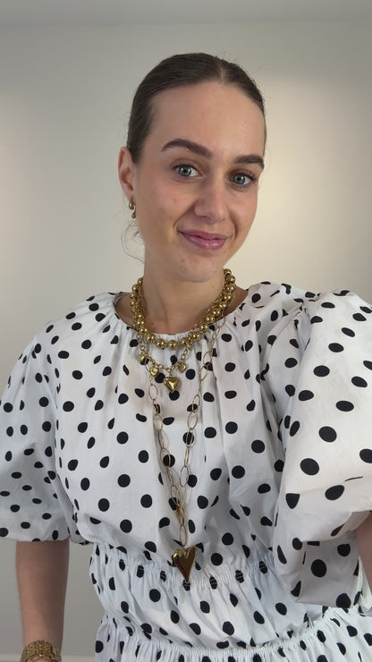 Polkadot top met pofmouw - wit zwart